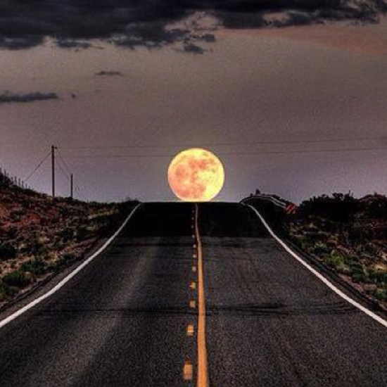 To the moon on his way home from Yosemite in California’s Sierra Nevada range, As the sun began its descent over the picturesque landscapes of Yosemite in California’s Sierra Nevada range